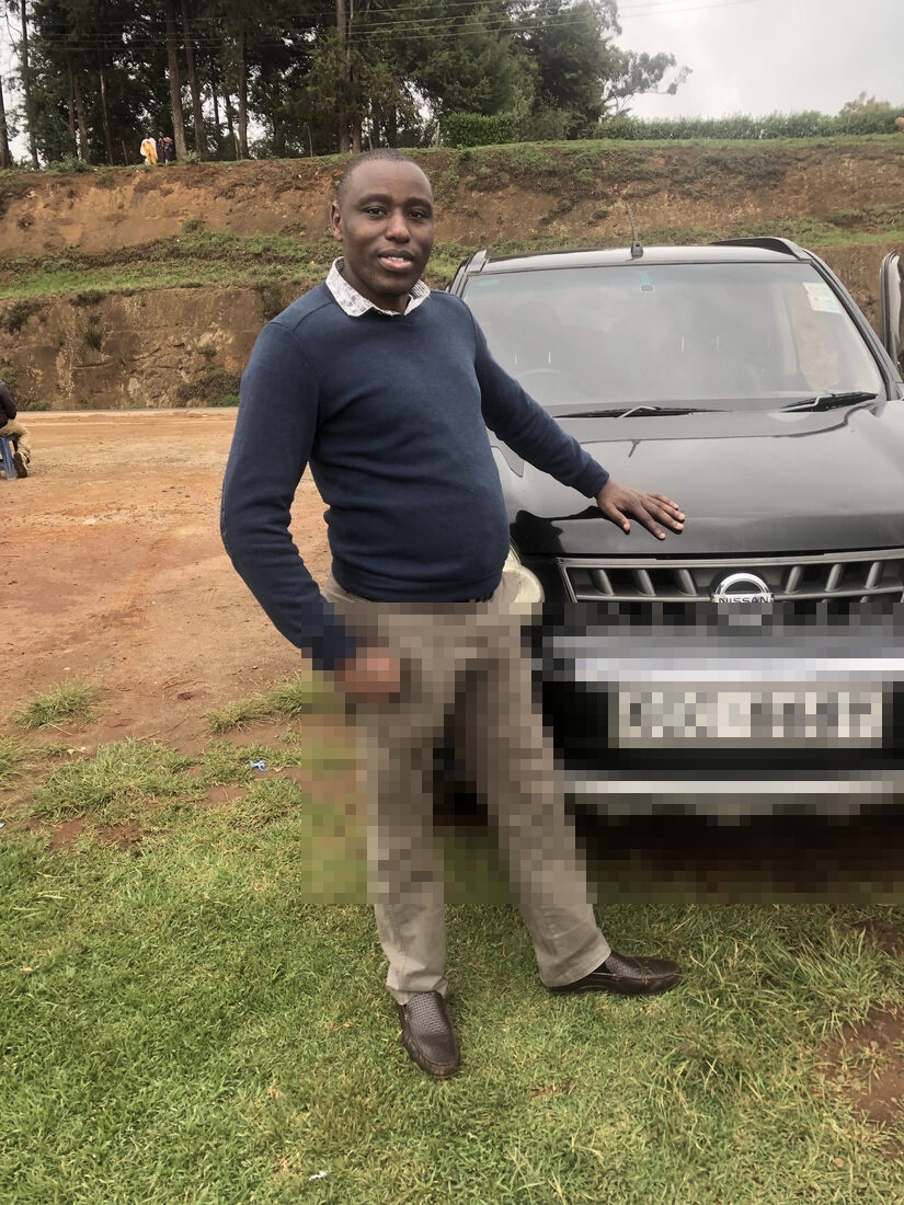 Macharia with a car